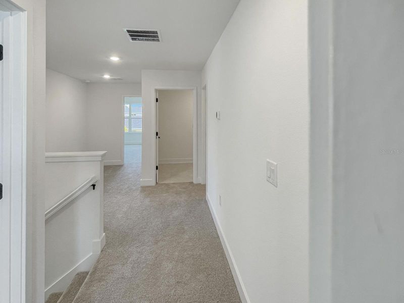 Spacious, unfurnished interior of a new home in Harmony Central, St. Cloud (Image 15).
