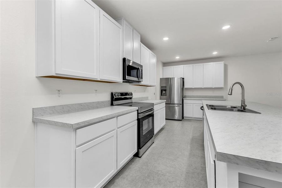 Furnished interior view inside a new home in , North Port (Image 15).