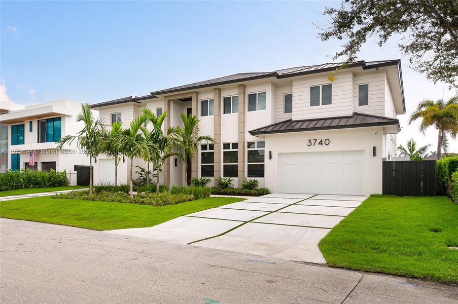 Front exterior of a new home in , Lighthouse Point, FL, highlighting curb appeal (Image 2).