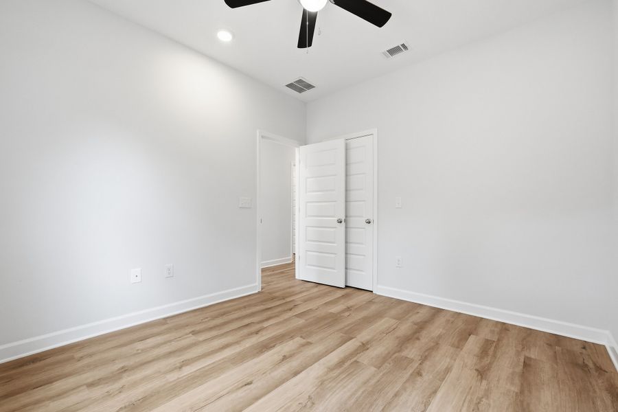 Spacious, unfurnished interior of a new home in Live Oak Cottages, Freeport (Image 21). Spacious, unfurnished interior of a new home in Live Oak Cottages, Freeport (Image 21).