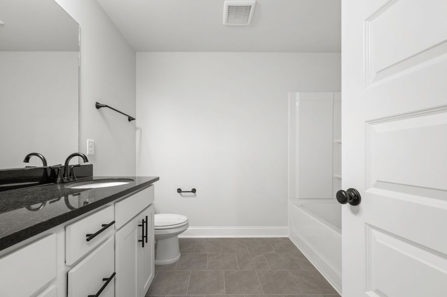 Front exterior of a new home in Saddlebrook, Murfreesboro, TN, highlighting curb appeal (Image 22).