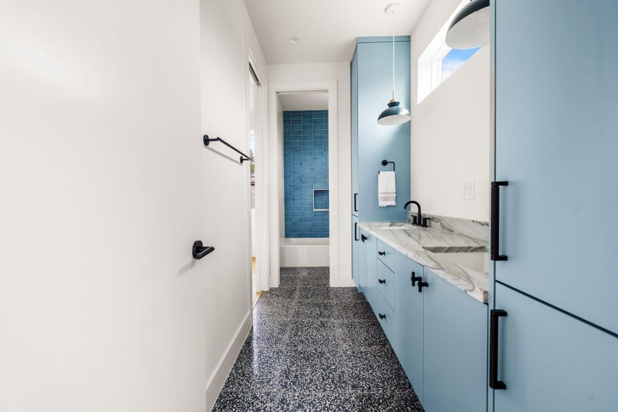 Jack & Jill bathroom with dual vanities shared by bedroom #3 & #4