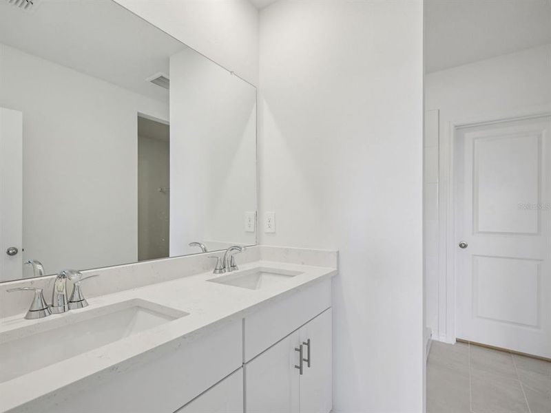 Furnished interior view inside a new home in Magnolia Bay - Premier Series, Nokomis (Image 5).