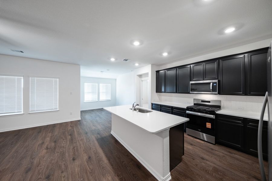 Furnished interior view inside a new home in The Villages of Hurricane Creek, Anna (Image 6).