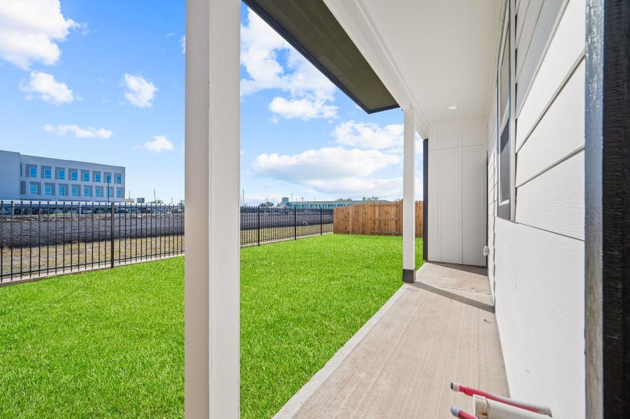 Exterior details and patio area of a home in Metro Village, Houston (Image 4).
