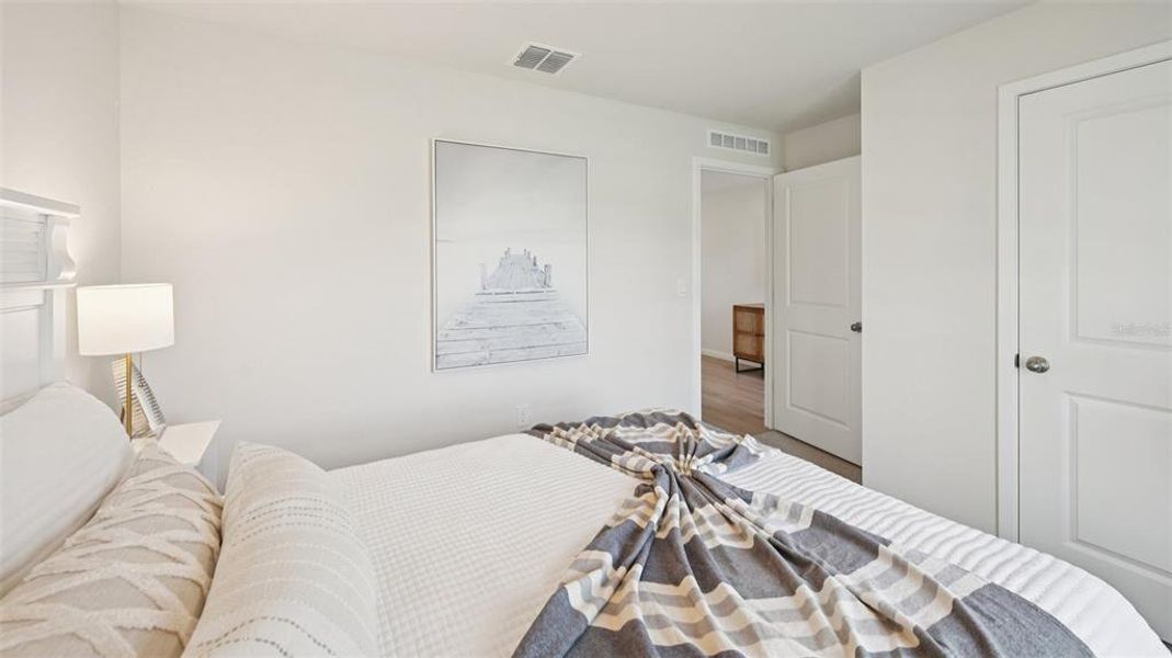 Furnished interior view inside a new home in Cove at West Port - Express, Port Charlotte (Image 7).