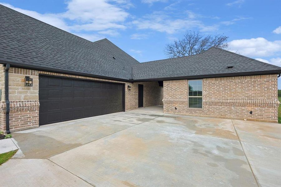 Front exterior of a new home in , Weatherford, TX, highlighting curb appeal (Image 24). Front exterior of a new home in , Weatherford, TX, highlighting curb appeal (Image 24).
