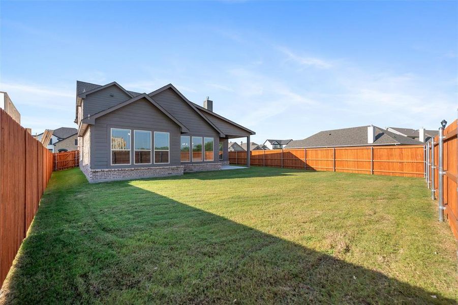 Exterior details and patio area of a home in Northstar, Haslet (Image 2).