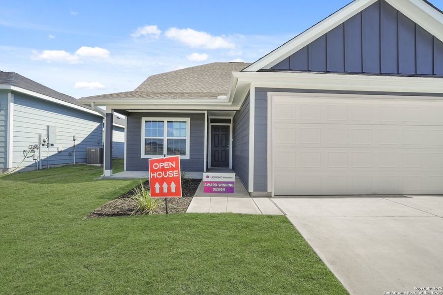 Front exterior of a new home in Swenson Heights, Seguin, TX, highlighting curb appeal (Image 19). Front exterior of a new home in Swenson Heights, Seguin, TX, highlighting curb appeal (Image 19).