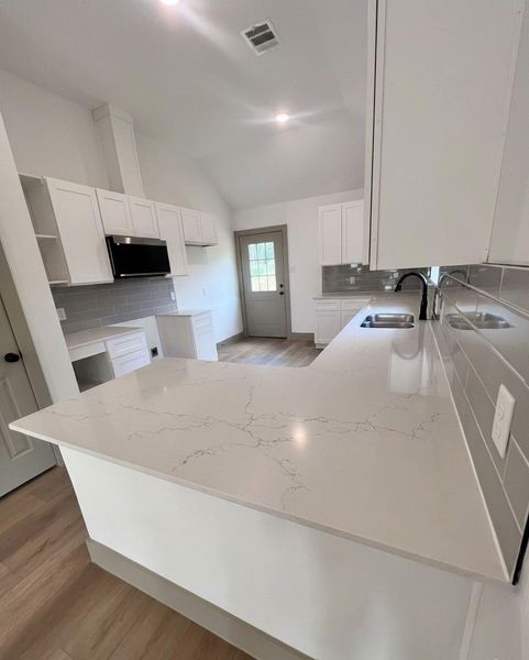 Furnished interior view inside a new home in , Hempstead (Image 3).