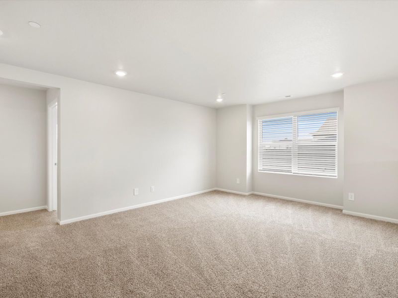 Spacious, unfurnished interior of a new home in Buffalo Highlands: The Flora Collection, Commerce City (Image 13).