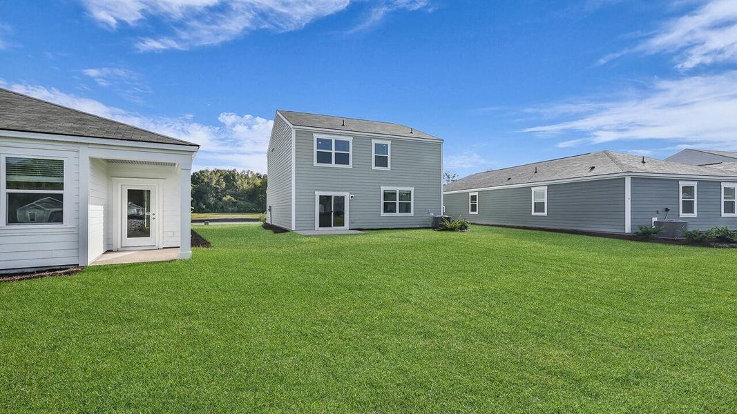 Exterior details and patio area of a home in The Oaks at Center Station, Hollywood (Image 2).