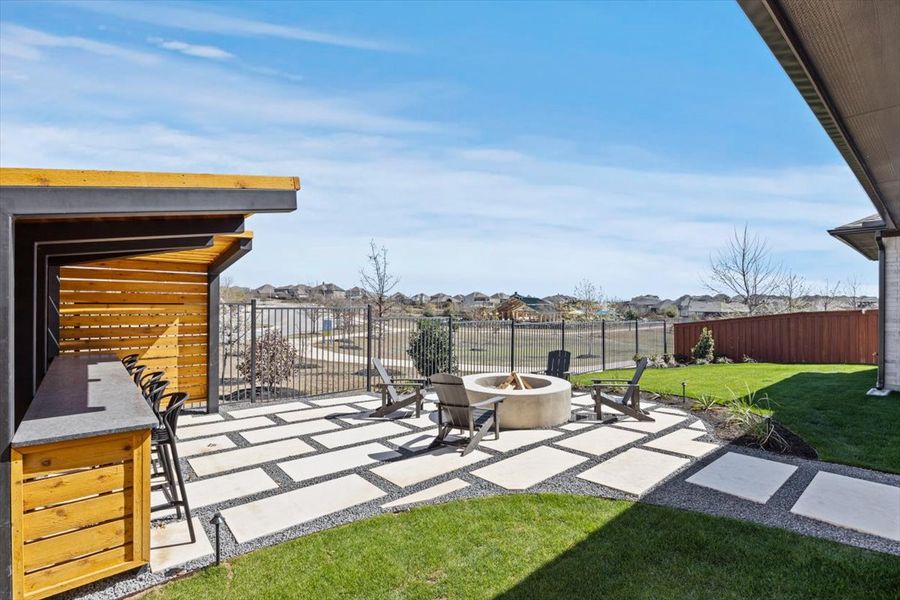 Exterior details and patio area of a home in Gregg Ranch, Marble Falls (Image 23).