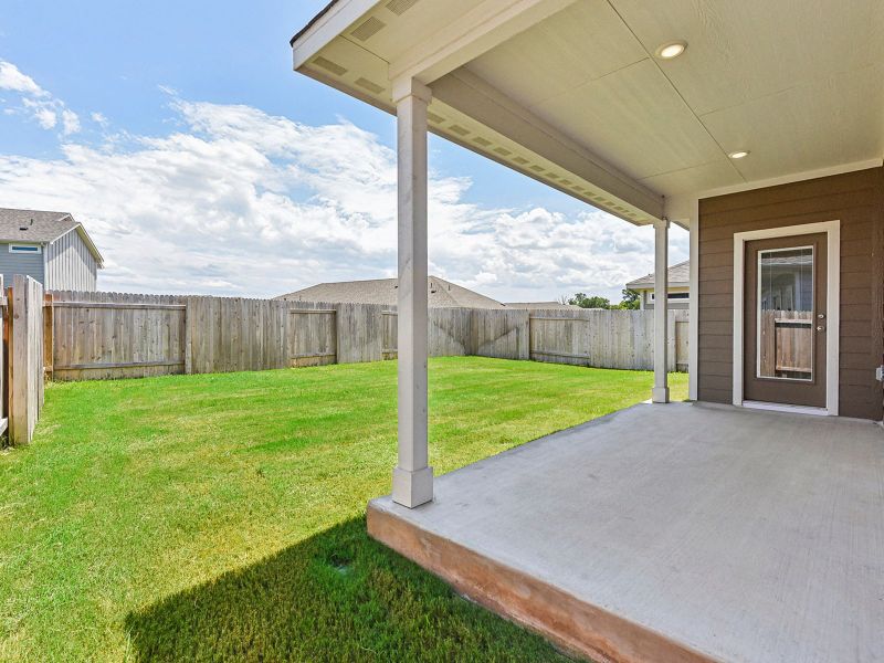 Spend some time in the shade on the back patio or spend some time in sun in the backyard.