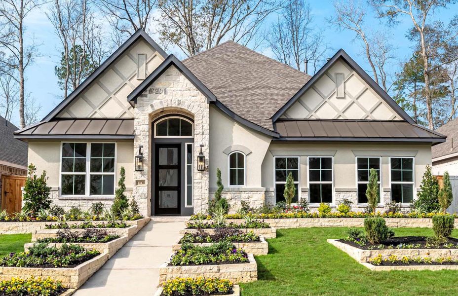 Front exterior of a new home in The Highlands 55′, Porter, TX, highlighting curb appeal (Image 1). Front exterior of a new home in The Highlands 55′, Porter, TX, highlighting curb appeal (Image 1).