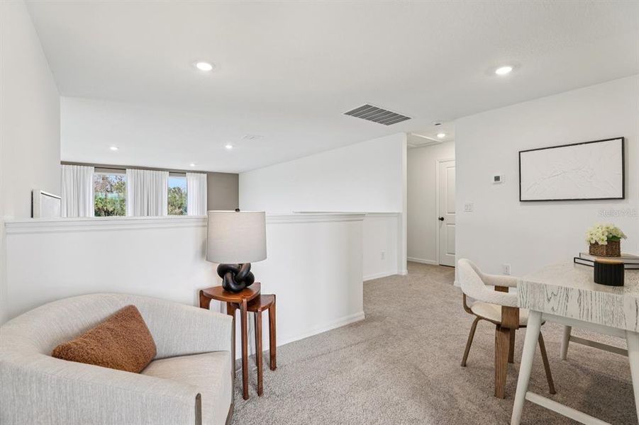 Furnished interior view inside a new home in Hawks Run, Kissimmee (Image 32).