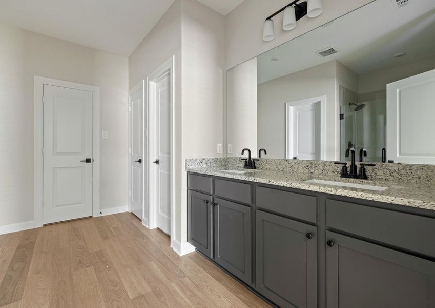 Dual sink vanity in the master bathroom