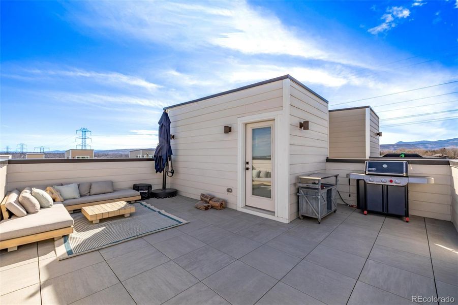 Exterior details and patio area of a home in Haskins Station, Arvada (Image 22).