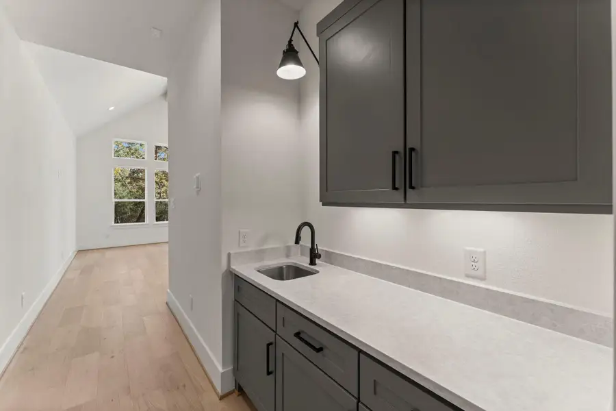 Furnished interior view inside a new home in Homestead Hill, New Waverly (Image 6).