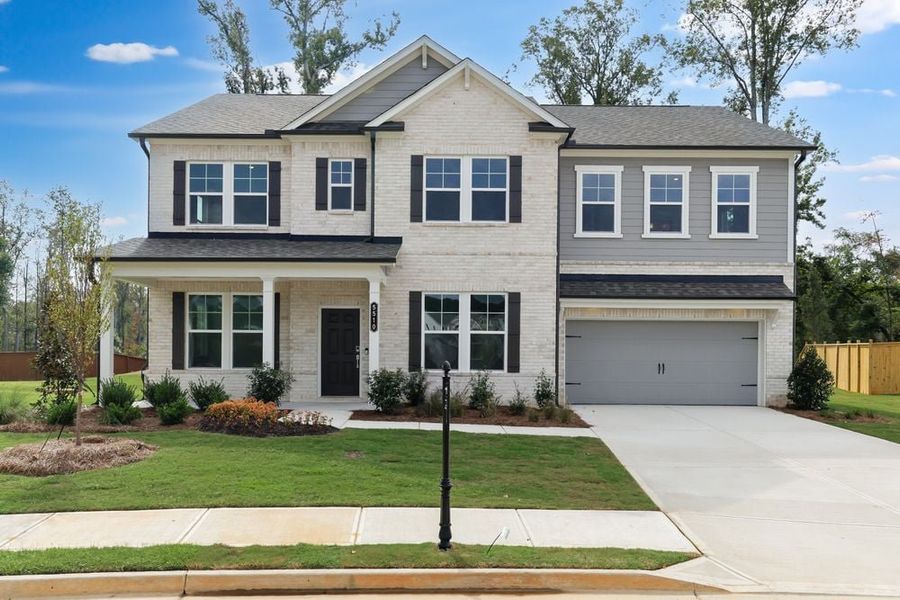 Front exterior of a new home in Kennison Creek, Cumming, GA, highlighting curb appeal (Image 1). Front exterior of a new home in Kennison Creek, Cumming, GA, highlighting curb appeal (Image 1).
