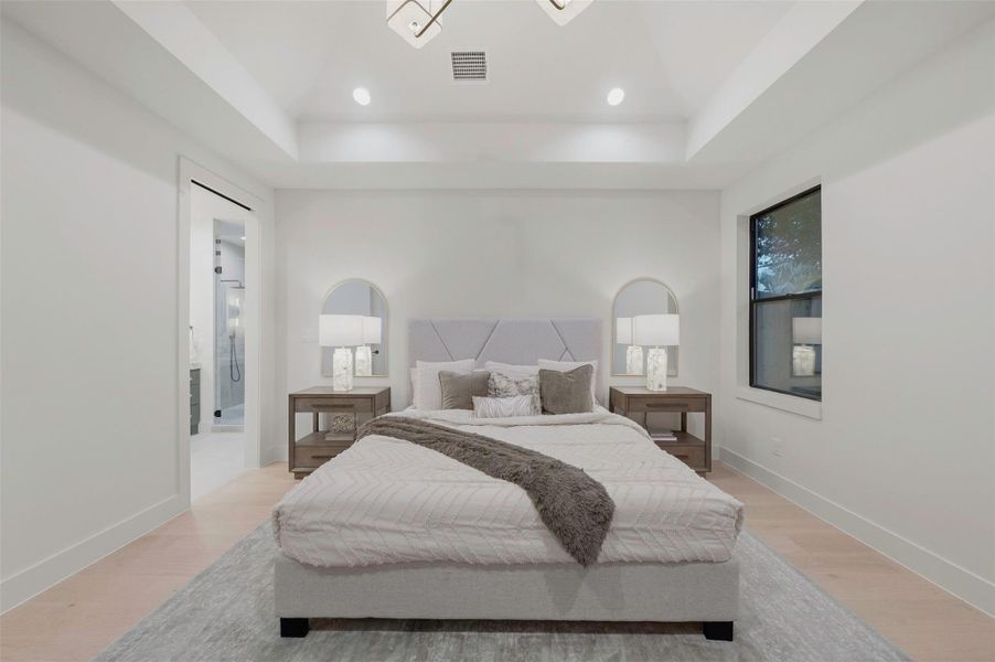 Positioned at the rear of the home, the primary bedroom overlooks the backyard and creates a quiet, private retreat to unwind at the end of the day.