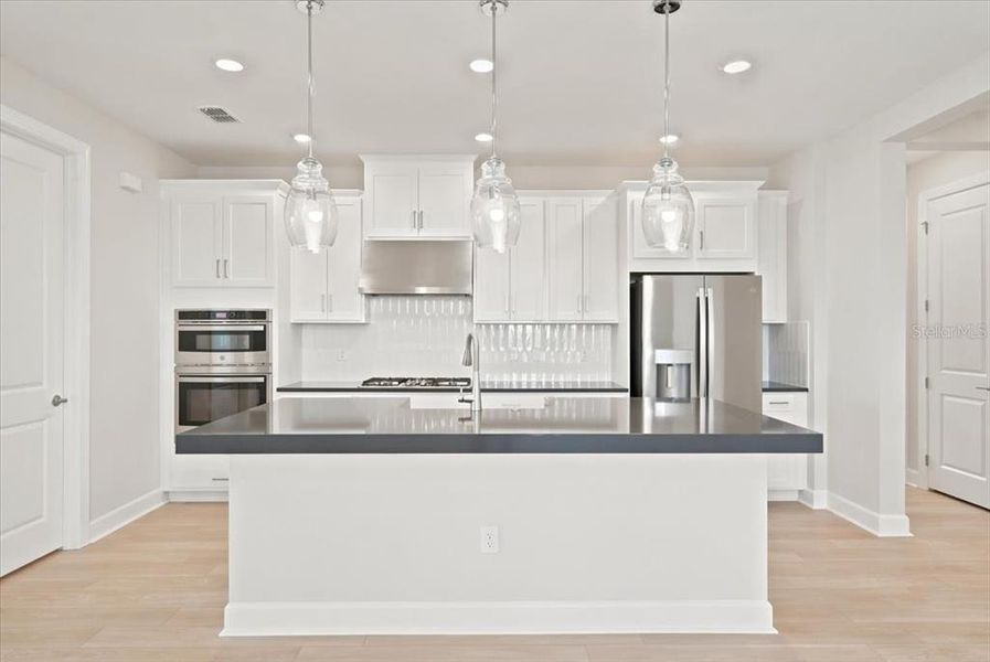 Furnished interior view inside a new home in Coasterra Community Group Page, Palmetto (Image 7).