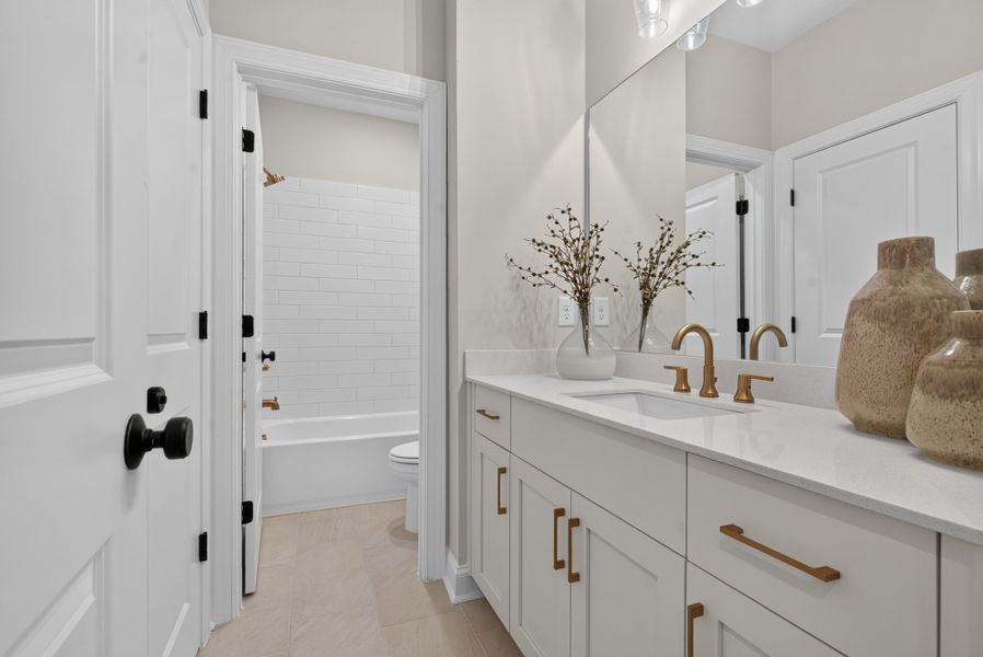 Representative furnished interior of a home built from the The Benton IV by The Providence Group in Ward's Crossing Townhomes, Johns Creek (Image 39).
