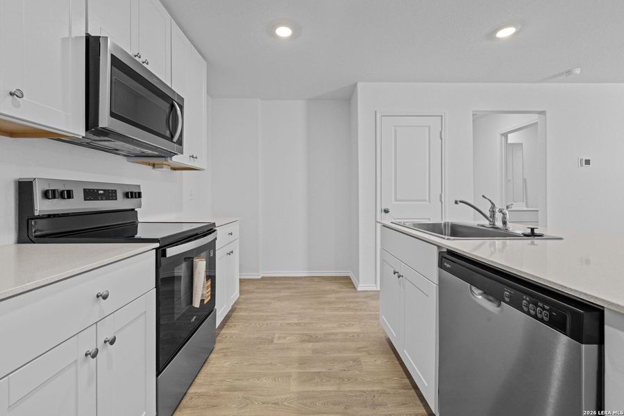 Furnished interior view inside a new home in Arroyo Ranch, Seguin (Image 5).