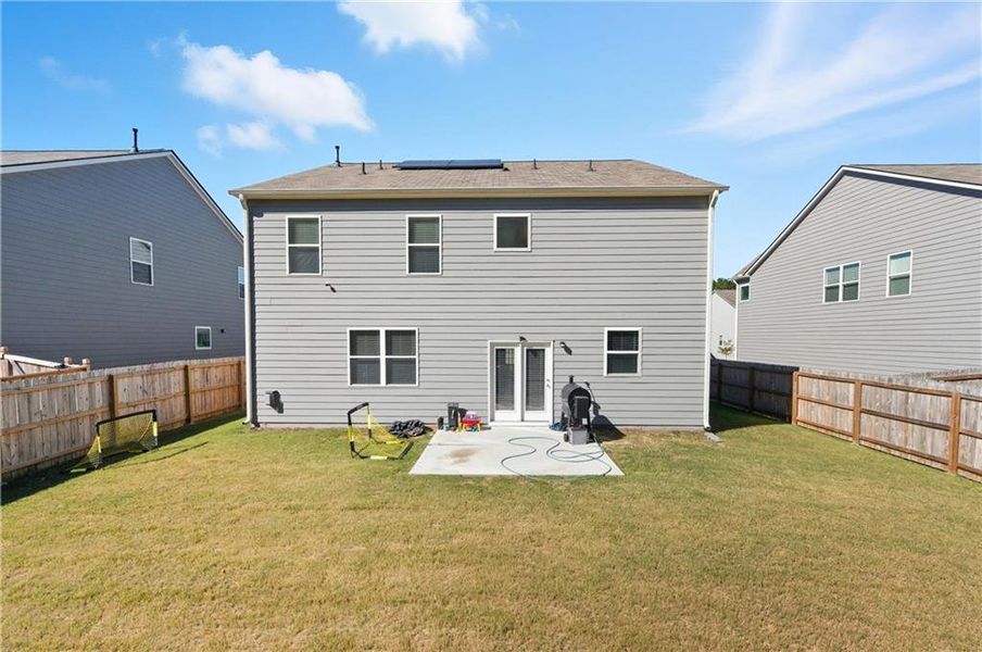 Exterior details and patio area of a home in Oakhurst Glen, Fairburn (Image 3). Exterior details and patio area of a home in Oakhurst Glen, Fairburn (Image 3).