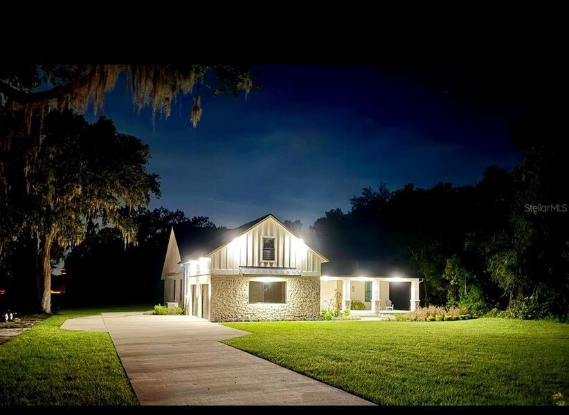 Front exterior of a new home in , Deland, FL, highlighting curb appeal (Image 1).