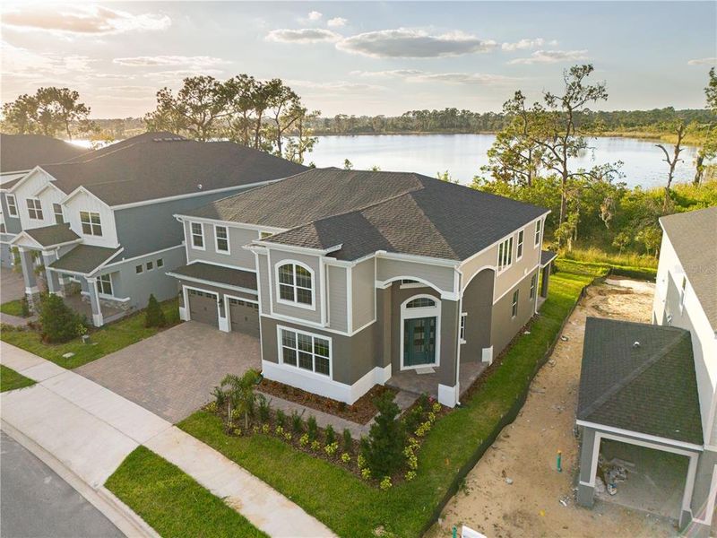 Front exterior of a new home in , Winter Garden, FL, highlighting curb appeal (Image 31). Front exterior of a new home in , Winter Garden, FL, highlighting curb appeal (Image 31).