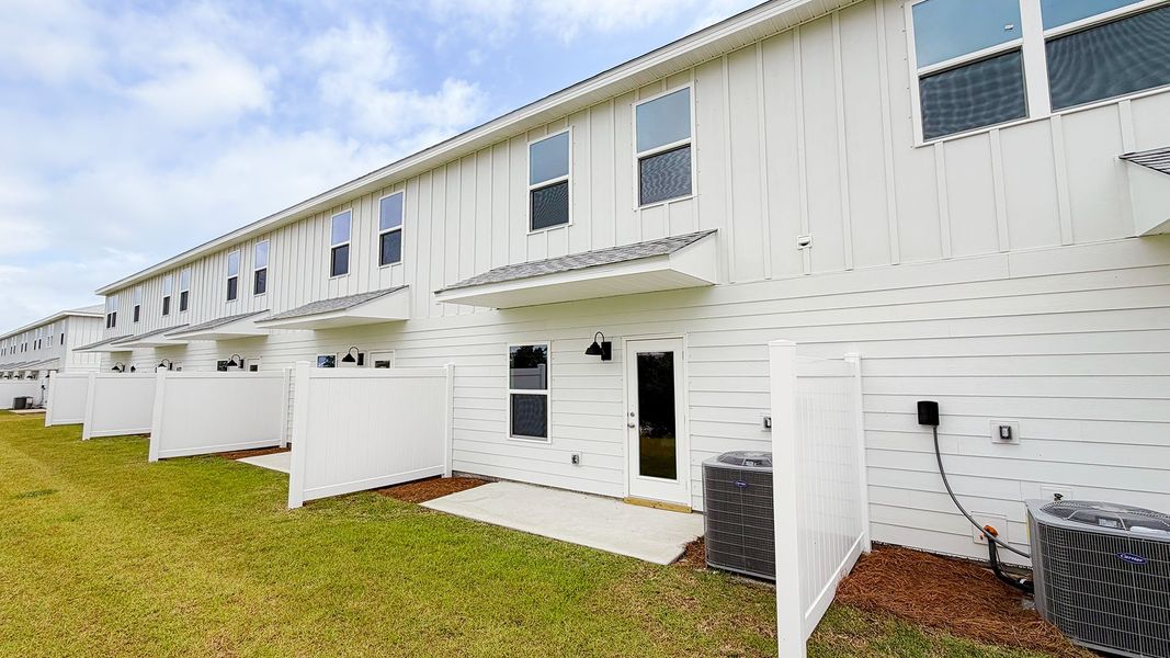 Exterior details and patio area of a home in Salt Creek Townhomes at Mexico Beach, Mexico Beach (Image 21). Exterior details and patio area of a home in Salt Creek Townhomes at Mexico Beach, Mexico Beach (Image 21).