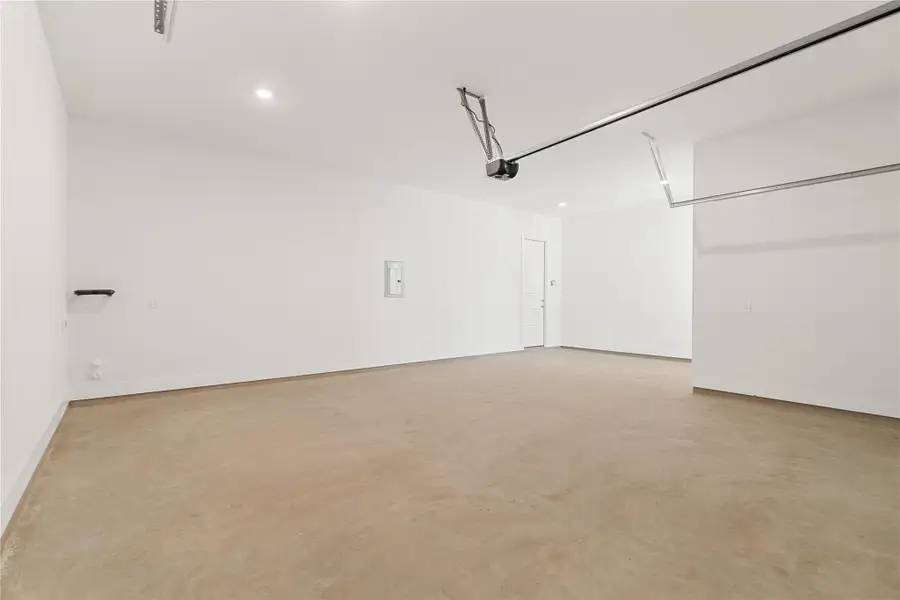 A spacious, pristine garage offers ample room and direct access to the home. A spacious, pristine garage offers ample room and direct access to the home.