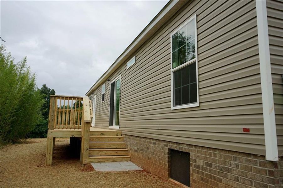 Exterior details and patio area of a home in , Demorest (Image 2). Exterior details and patio area of a home in , Demorest (Image 2).