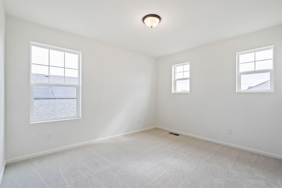 Spacious, unfurnished interior of a new home in The Nest Reserve at Canyon Creek, Erie (Image 18).
