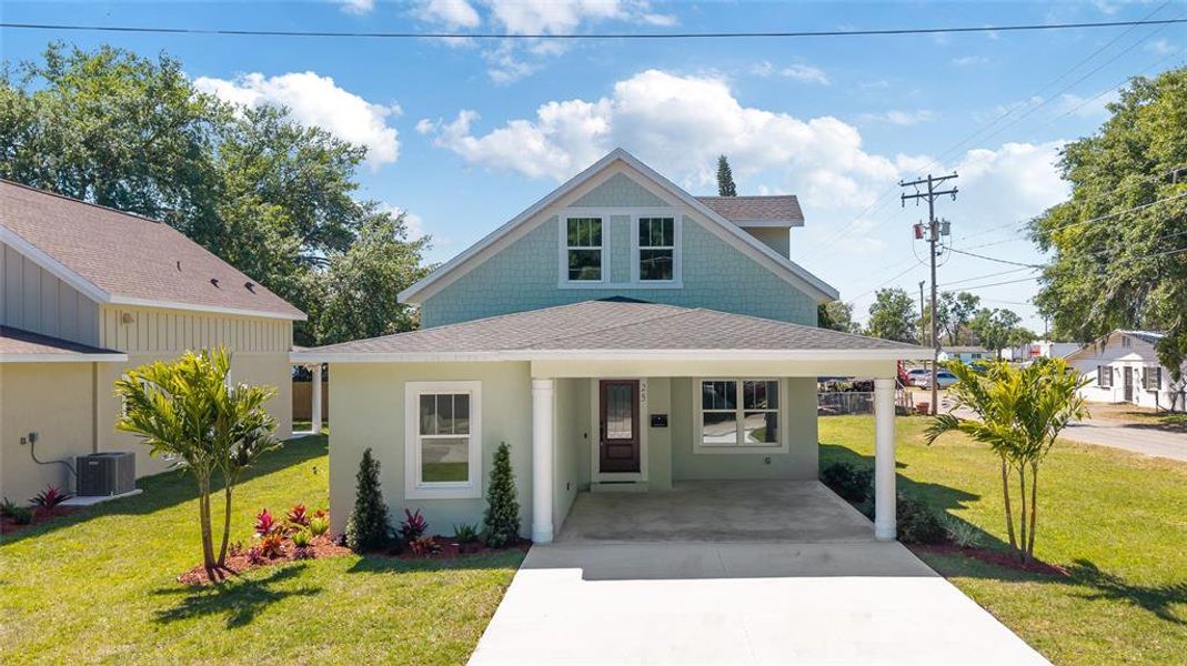 Front exterior of a new home in , Plant City, FL, highlighting curb appeal (Image 19).