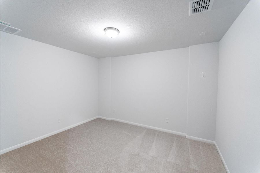Spacious, unfurnished interior of a new home in Santa Rita Ranch, Liberty Hill (Image 13).