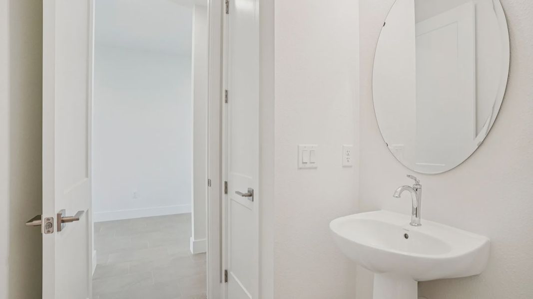 Plumeria Floor Plan first floor half bathroom with a linen closet by DRB Homes in Trailside located in Mount Dora, FL Plumeria Floor Plan first floor half bathroom with a linen closet by DRB Homes in Trailside located in Mount Dora, FL