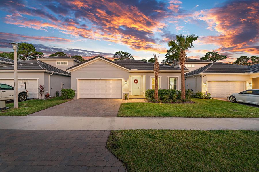 Front exterior of a new home in Banyan Bay, Stuart, FL, highlighting curb appeal (Image 2).