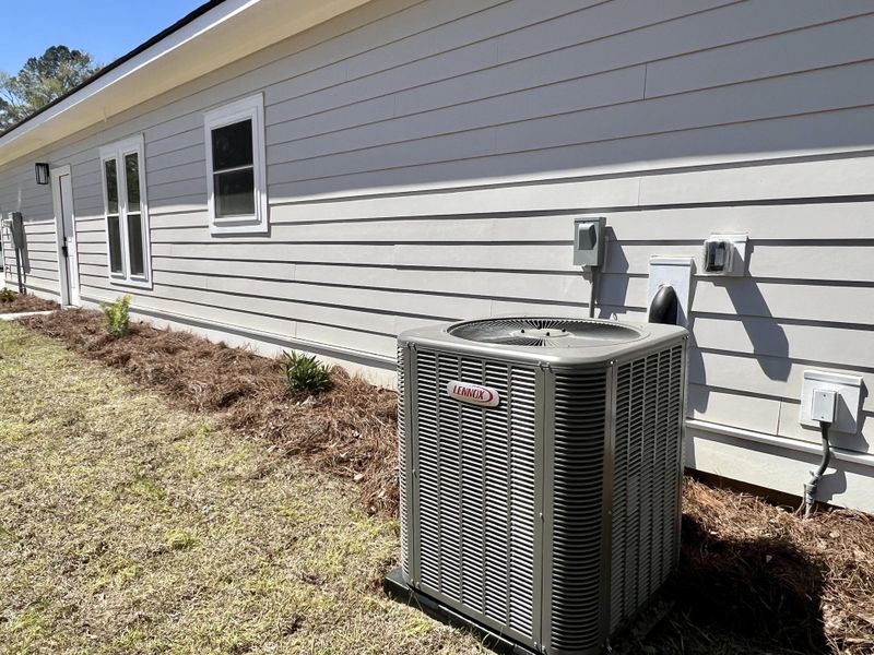 Exterior details and patio area of a home in , McClellanville (Image 18).