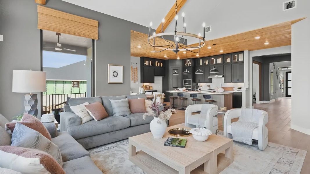 Representative furnished interior of a home built from the Melody by Chesmar Homes in Newhaven, Manor (Image 9).