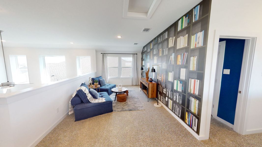 Representative furnished interior of a home built from the Saxony – 45′ Lot by Chesmar Homes in Sunterra, Katy (Image 9).