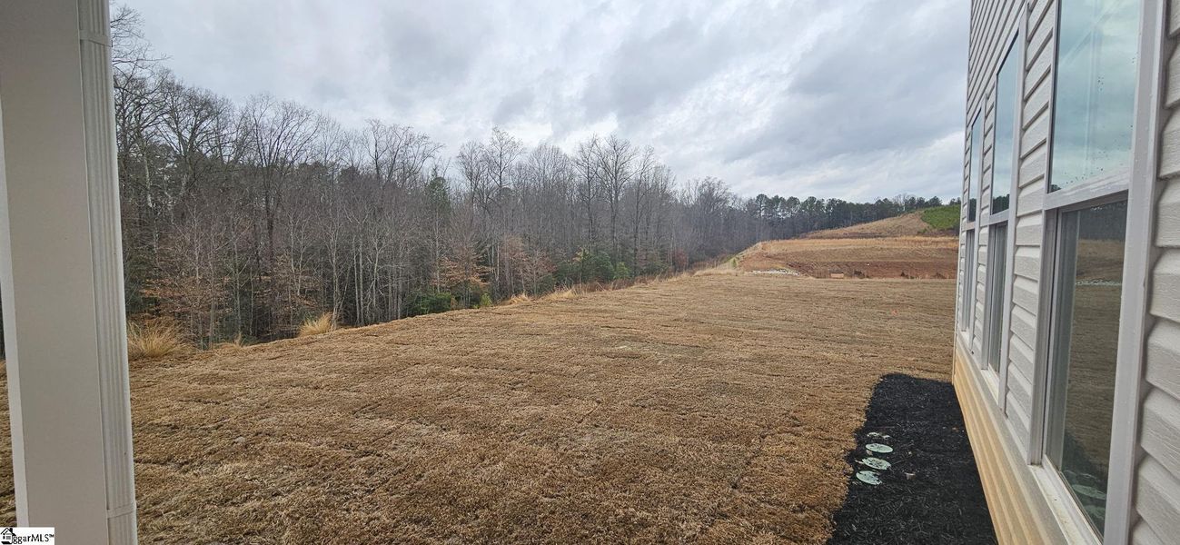 Exterior details and patio area of a home in Sedona, Greenville (Image 13).