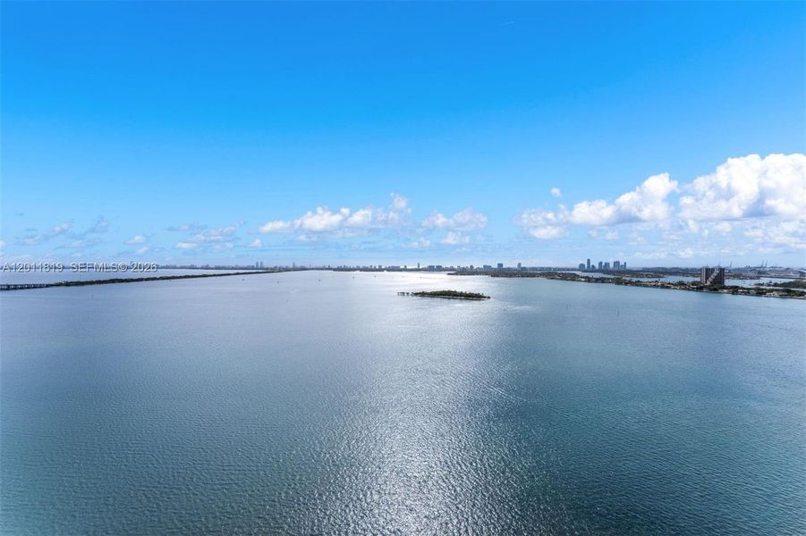 Breathtaking panoramic sunrise views of Biscayne Bay and the Atlantic Ocean from the expansive private terrace of Aria Reserve #2504 in Edgewater, Miami.
