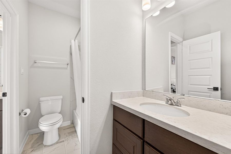 Furnished interior view inside a new home in Cane Island, Katy (Image 11).