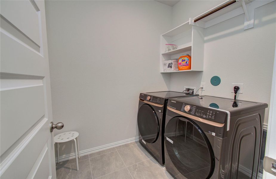 Furnished interior view inside a new home in Sunterra, Katy (Image 25).