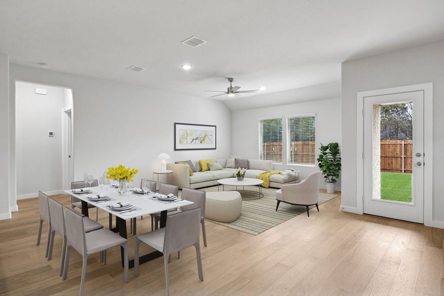 Living and Dining Room in the Heisman home plan by Trophy Signature Homes – REPRESENTATIVE PHOTO