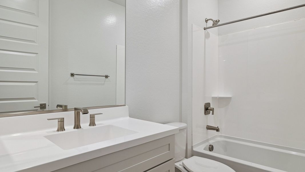 Representative furnished interior of a home built from the Hayden by D.R. Horton in The Ridge at Stone Butte, Phoenix (Image 6).