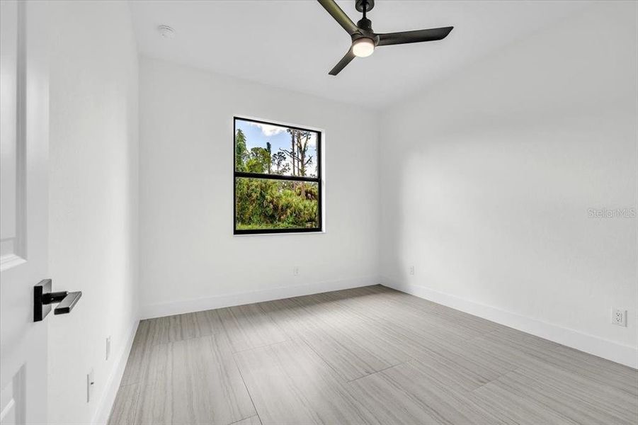 Spacious, unfurnished interior of a new home in , Port Charlotte (Image 33).