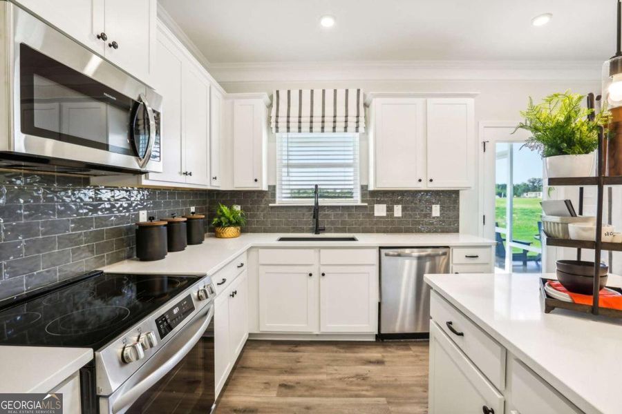 Furnished interior view inside a new home in Cobblestone Crossing Commons, Warner Robins (Image 11).